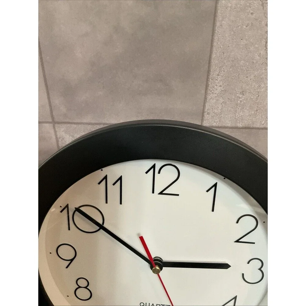 Universal Wall Clock 9 3/4 In Diameter Black Case